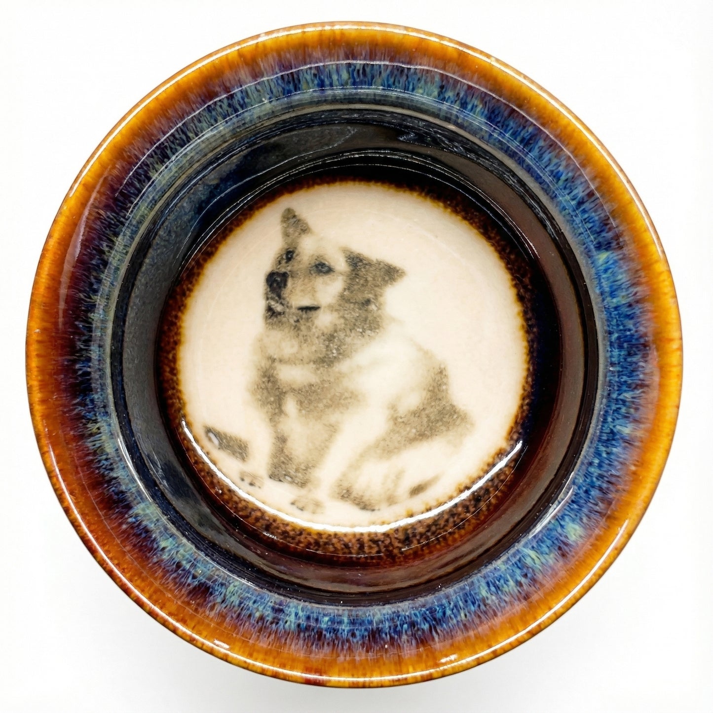 Loyal Dog motif inside a handmade ceramic tea bowl, durable teaware for daily use.