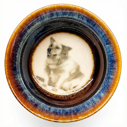 Loyal Dog motif inside a handmade ceramic tea bowl, durable teaware for daily use.