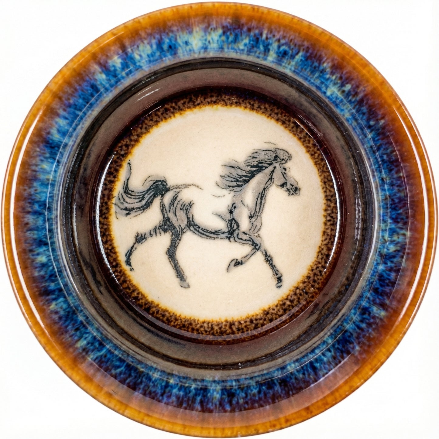 Dynamic ceramic tea cup featuring a galloping Horse illustration inside, high-quality pottery gift.